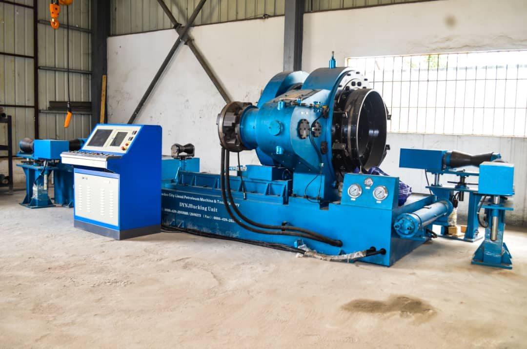 Fully automated bucking unit with torque-turn monitoring