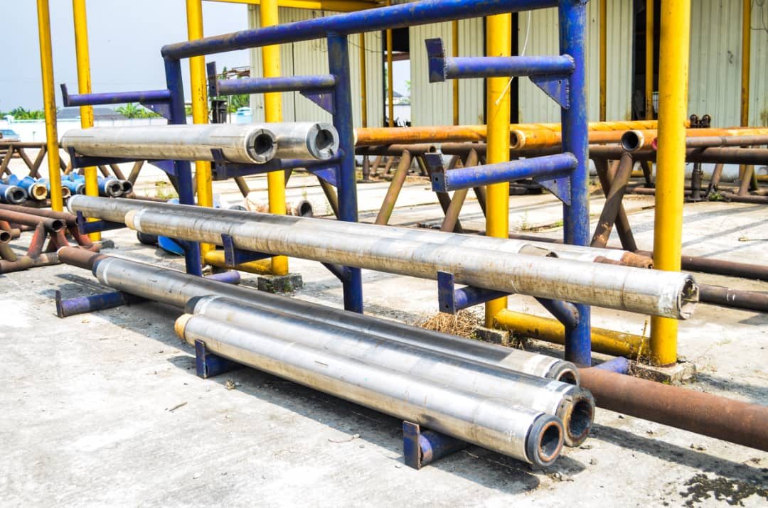 Pipe racks stacked with casing and tubing at the Reveille yard